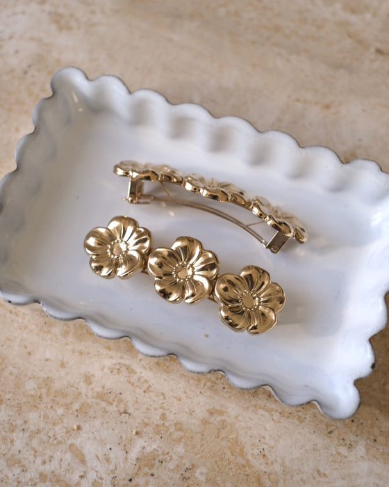 Barrette à cheveux Marceline Paris couleur or rose avec des détails raffinés, parfaite pour compléter une tenue chic.