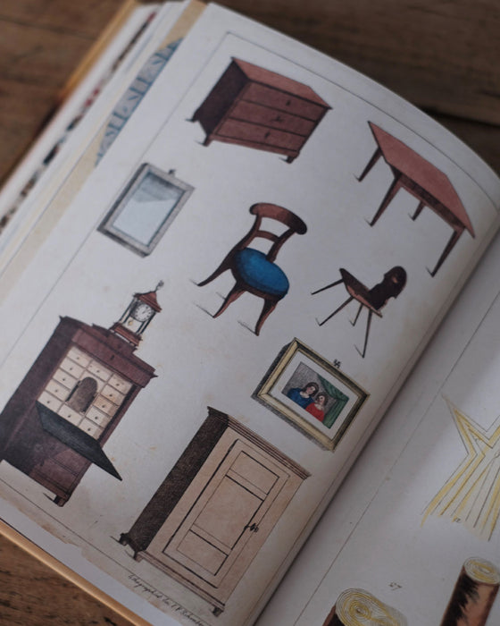 Livre de stickers avec des illustrations variées, adapté aux amateurs d'art et aux passionnés de bricolage.