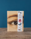Carnet de stickers avec une couverture colorée, offrant une collection variée d'autocollants artistiques.
