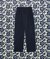 Pantalon peintre en navy, style décontracté, avec des poches pratiques et une coupe ample.